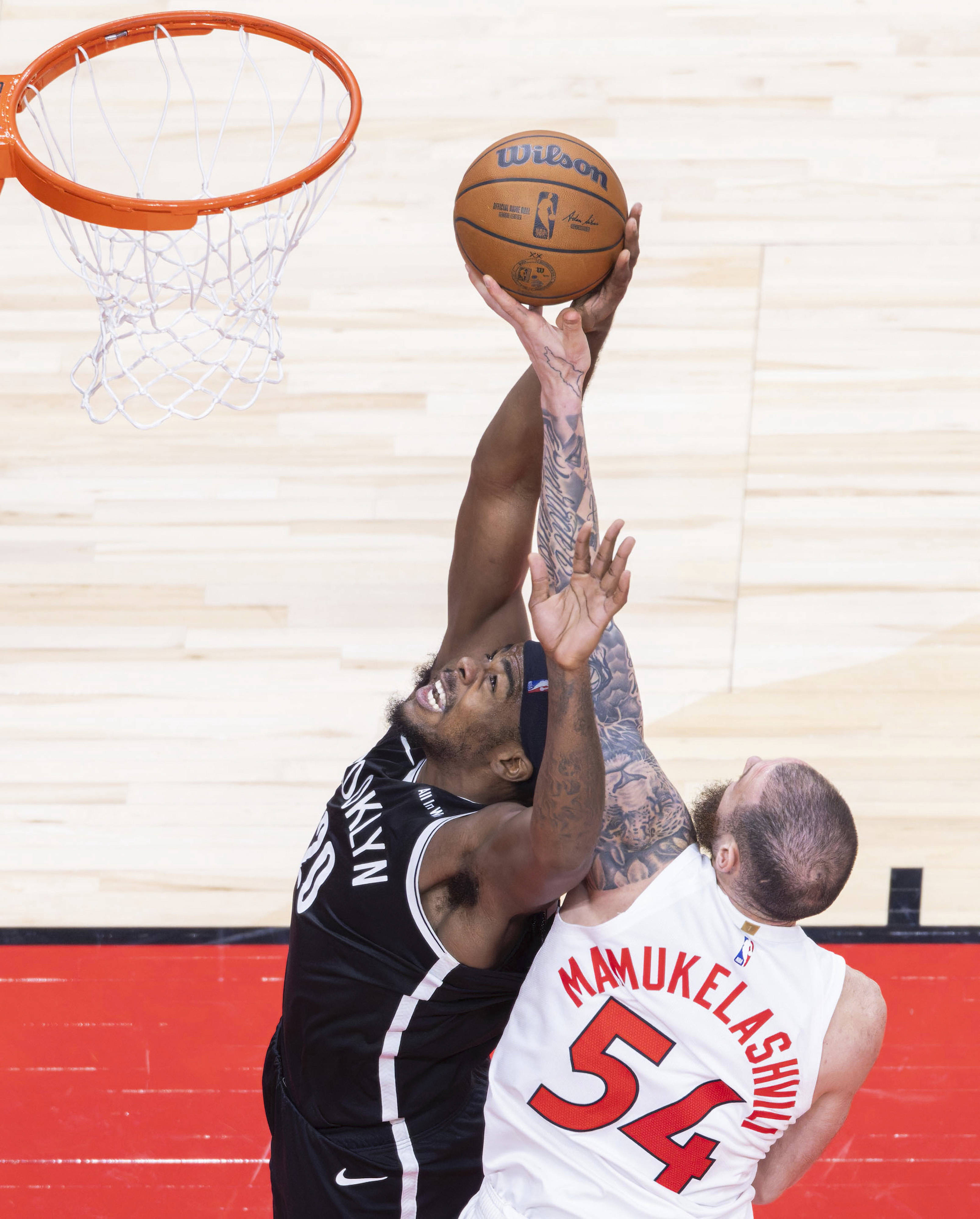 (体育)篮球——NBA季前赛:猛龙胜篮网